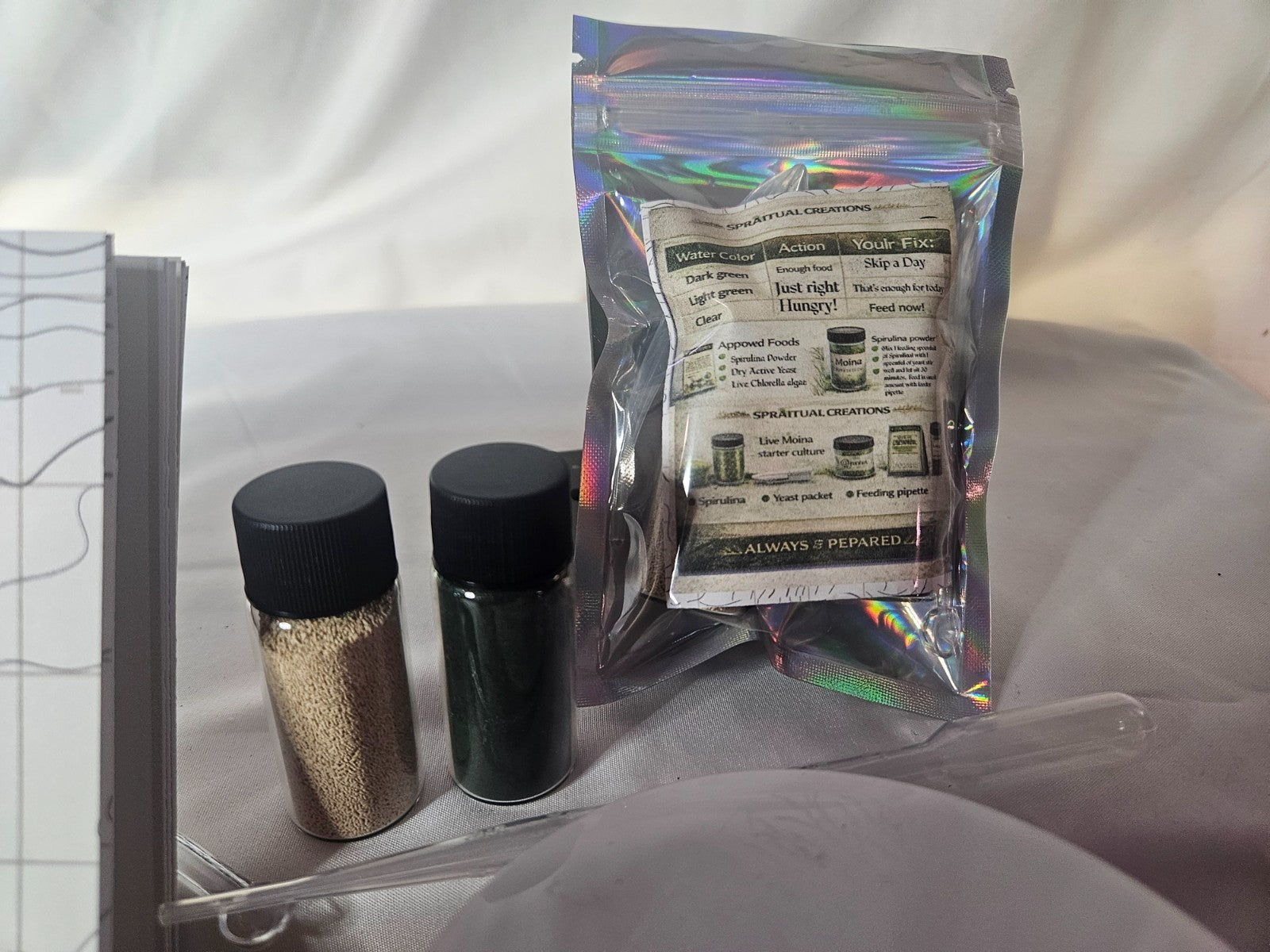 2000+ Live Moina Macrocopa 22oz container, with spirulina and dry yeast food mix